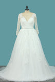 A Line Tulle V Neck Long Sleeves Wedding Dresses With Applique And Beads Sweep