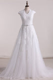 A Line V Neck With Applique Wedding Dresses Tulle Court Train